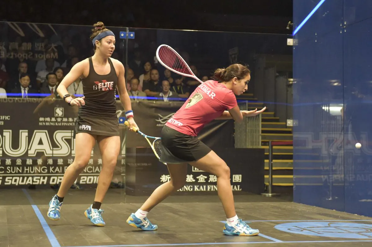 Nouran Gohar, of Egypt (on strike) playing Amanda Sobhy of America in the final of the Hong Kong Squash Open 2016 at the Hong Kong Park Sports Centre on Sunday Aug 28, 2016. (Bill Cox/Epoch Times)