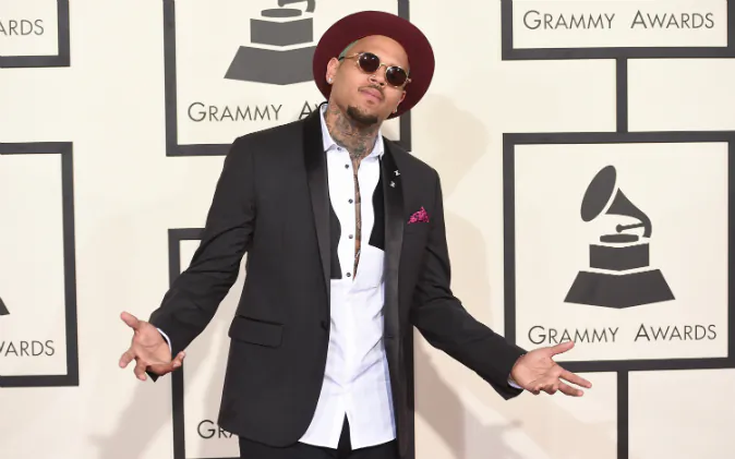 Singer Chris Brown attends The 57th Annual GRAMMY Awards at the STAPLES Center on February 8, 2015 in Los Angeles, California. (Jason Merritt/Getty Images). A woman claimed Chris Brown threatened her with a gun on Aug. 30.