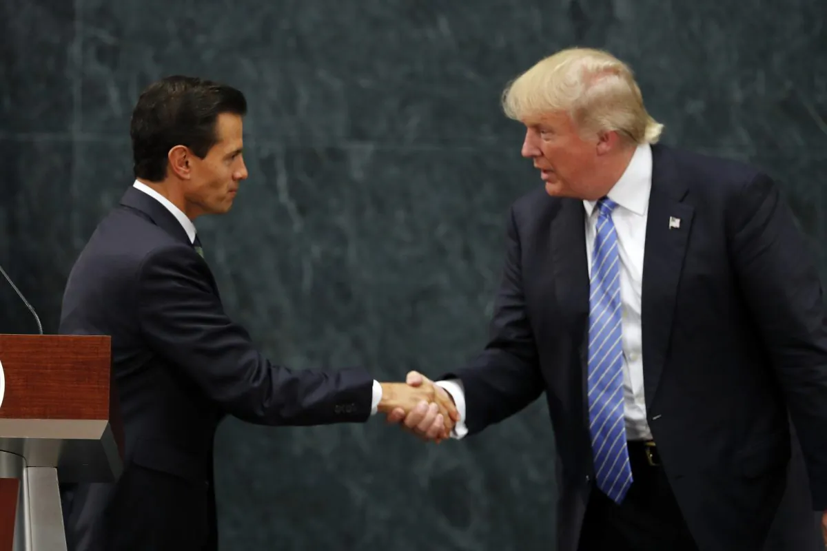 Mexico President Enrique Pena Nieto and Elect-President Donald Trump after a joint statement at Los Pinos, the presidential official residence, in Mexico City, on Aug. 31, 2016. (AP Photo/Dario Lopez-Mills)