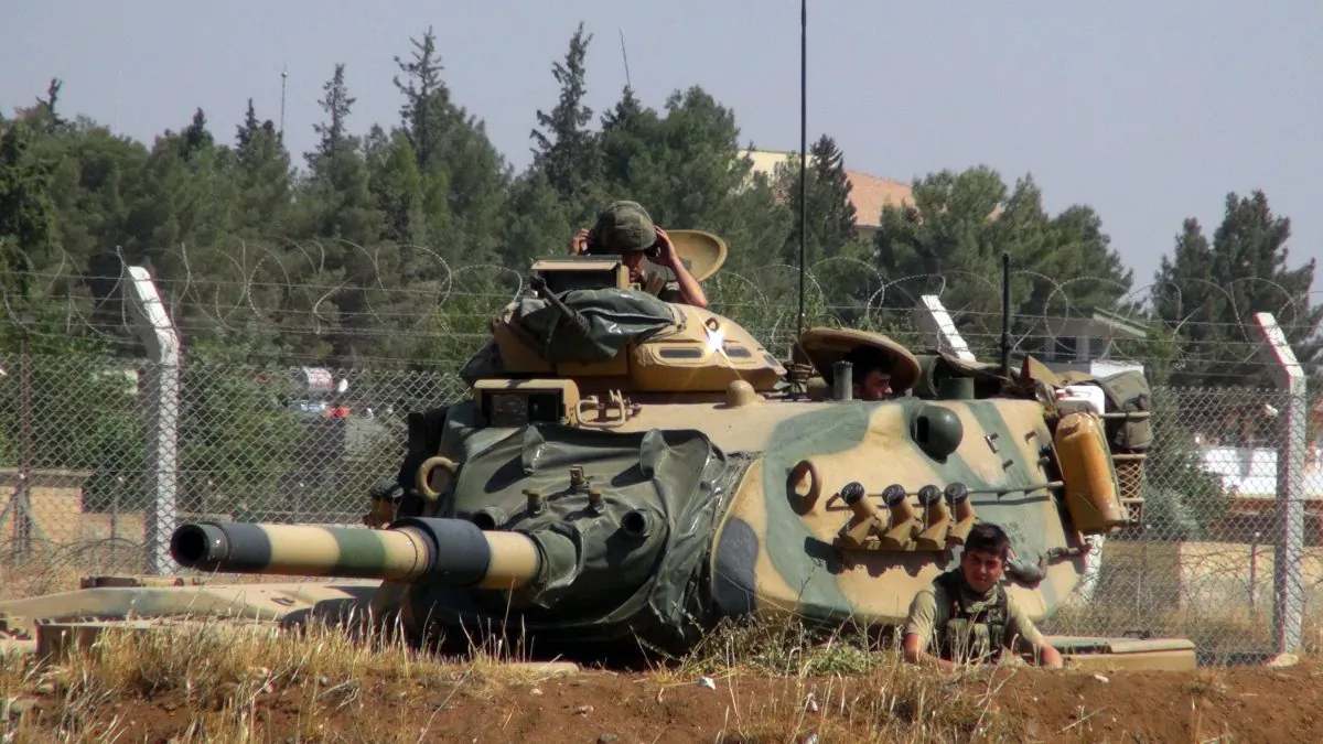 A Turkish army tank stationed near the Syrian border, in Suruc, Turkey on Sept. 3, 2016. (AP Photo)