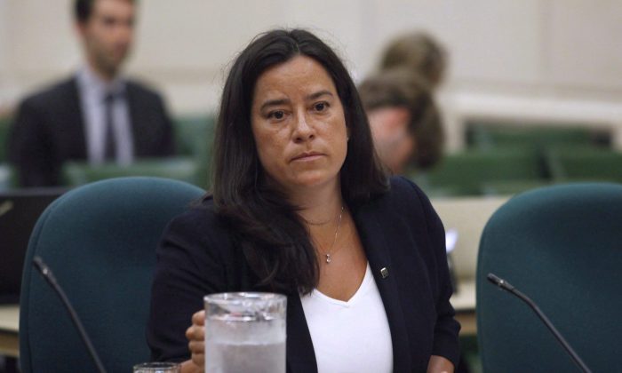 Justice Minister Jody Wilson-Raybould waits to appear at the House of Commons Standing Committee on Justice and Human Rights on Aug. 11, 2016. (The Canadian Press/ Patrick Doyle)