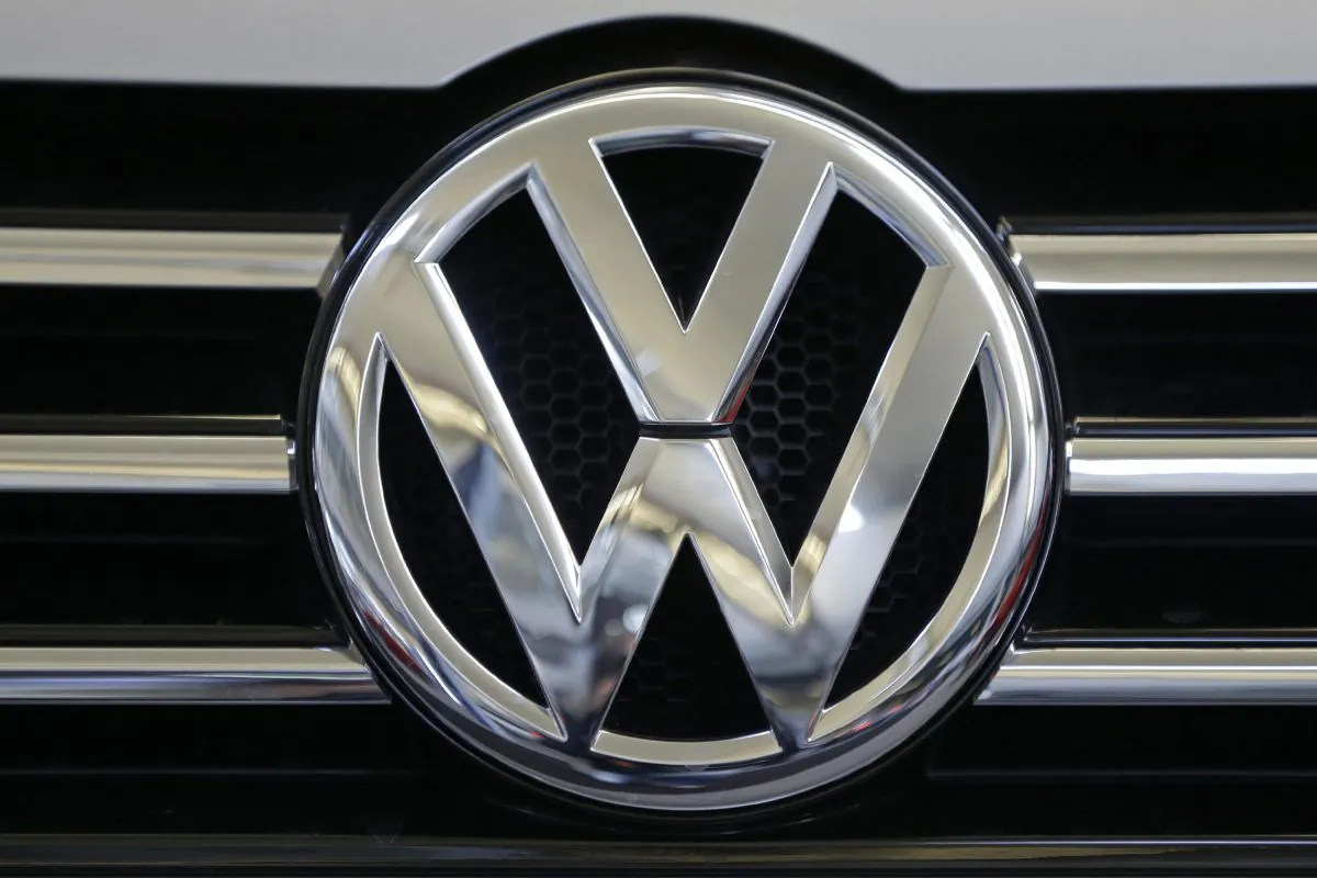 The Volkswagen logo on the grill of a Volkswagen on display in Pittsburgh on Feb. 14, 2013. (AP Photo/Gene J. Puskar)