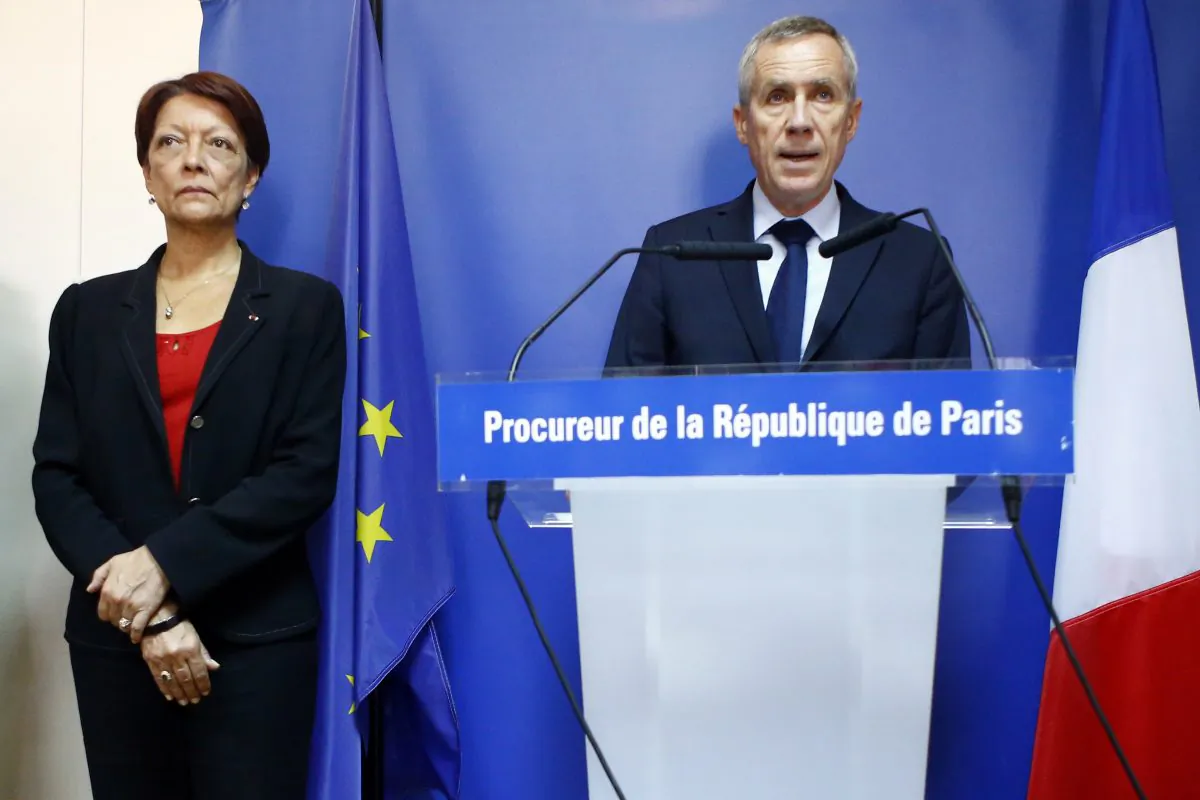 Paris Prosecutor Francois Molins (R), flanked with Director of the Judicial Police Mireille Ballestrazzi (L), addresses the media in Paris on Sept. 9, 2016. (AP Photo/Francois Mori)