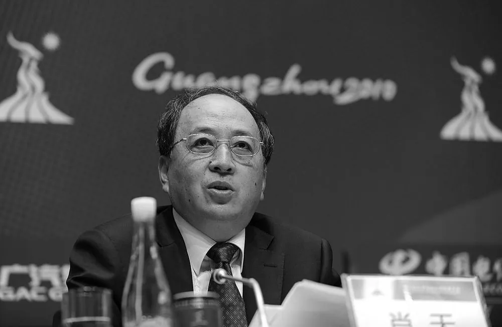 Xiao Tian speaks at a press conference at the media centre for the 16th Asian Games in Guangzhou on Nov. 10, 2010. (Peter Parks/AFP/Getty Images)
