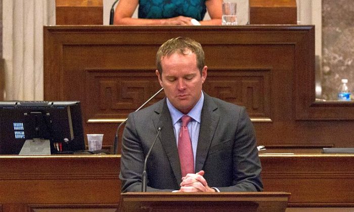 Republican Rep. Jeremy Durham, R-Franklin, addresses the House in Nashville, Tenn., on Tuesday, Sept. 13, 2016, from the well of the camber to urge his colleagues not to expel him from the Tennessee General Assembly. The move to expel Durham follows an attorney general's investigation that detailed allegations of improper sexual contact with at least 22 women over the course of his four years in office. House Speaker Beth Harwell, R-Nashville, presides at rear. (AP Photo/Erik Schelzig)