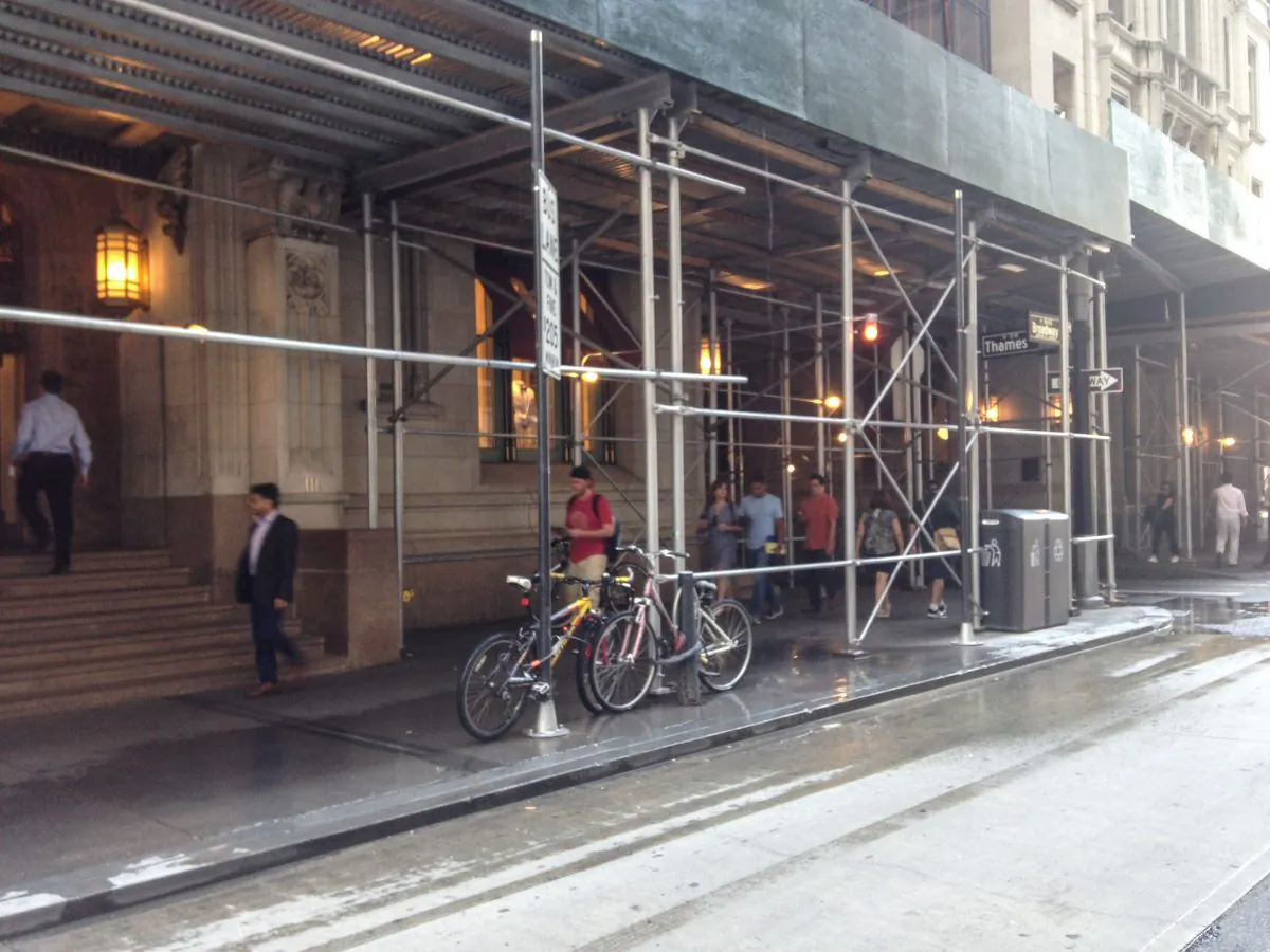 A sidewalk shed outside a retail store on Broadway in the Financial District, New York City, on Aug. 25, 2016. (Charlotte Cuthbertson/The Epoch Times)