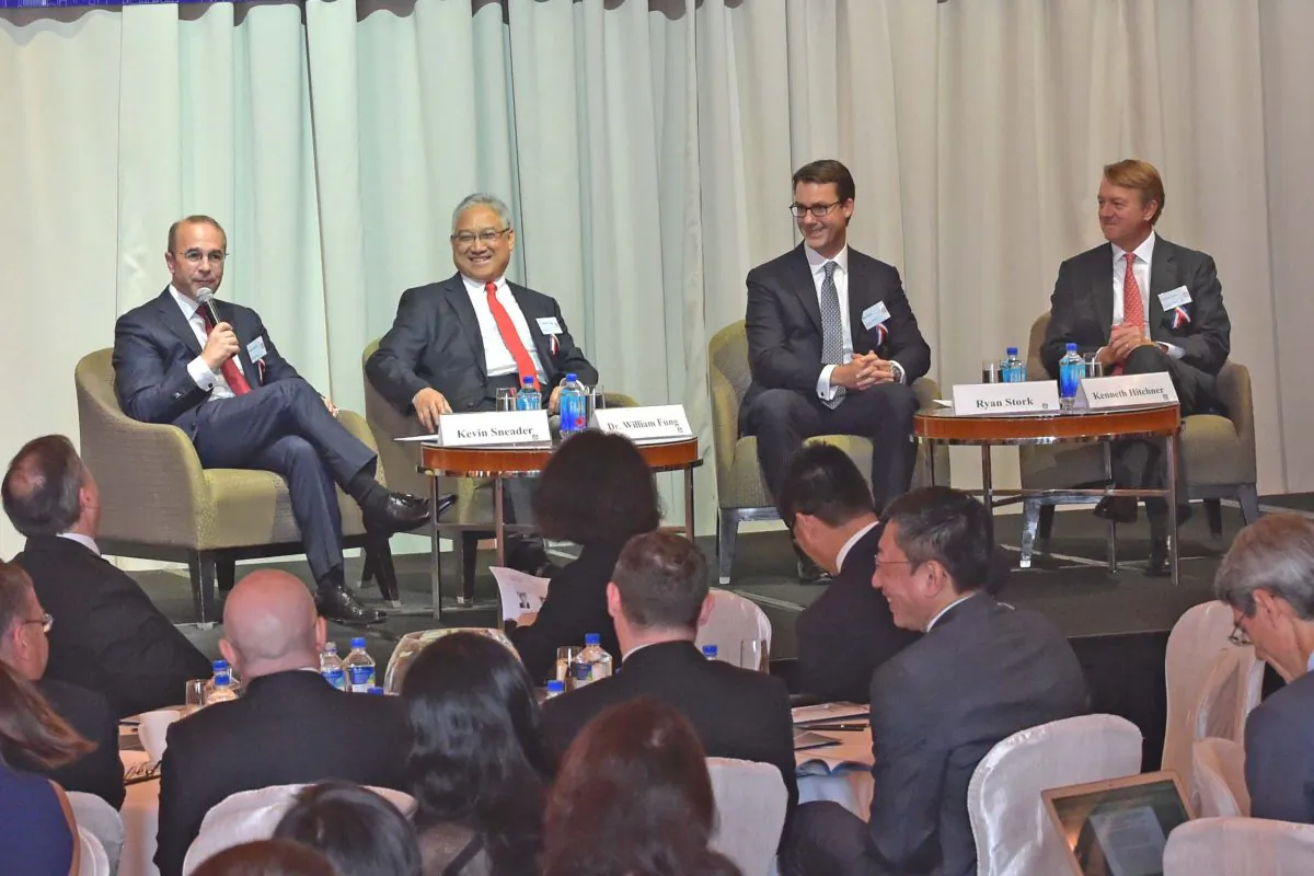 Panel 1 in action at the AmCham China Conference 2016, at the Four Seasons Hotel, Hong Kong on Friday Sept 9. (L-R) Kevin Sneader (Moderator), William Fung, Chairman Li & Fung, Ryan Stork of Blackrock and Kenneth Hitchner, of Goldman Sachs. (Bill Cox/Epoch Times)