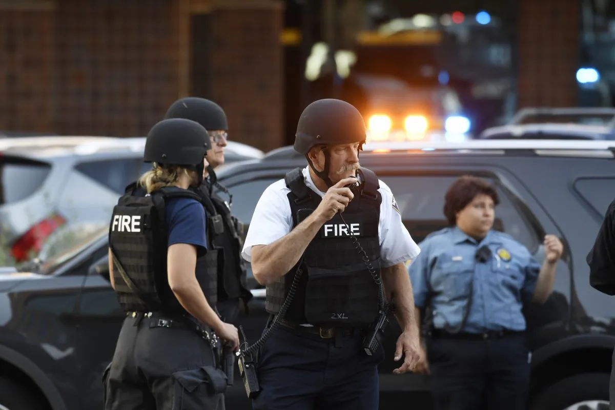 A Denver hospital complex was placed on lockdown Friday, Sept. 16, 2016, after a report that a man was seen carrying a rifle on the complex grounds. (Andy Cross/The Denver Post via AP)