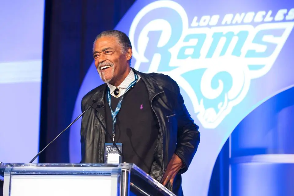84 year-old Roosevelt Grier, a member of the fabled Fearsome Foursome, and now an ordained minister, gives the invocation at the Kick Off for Charity Luncheon, hosted by the Los Angeles rams Charitable Foundation. (Ric Tapia/LA Rams Foundation)