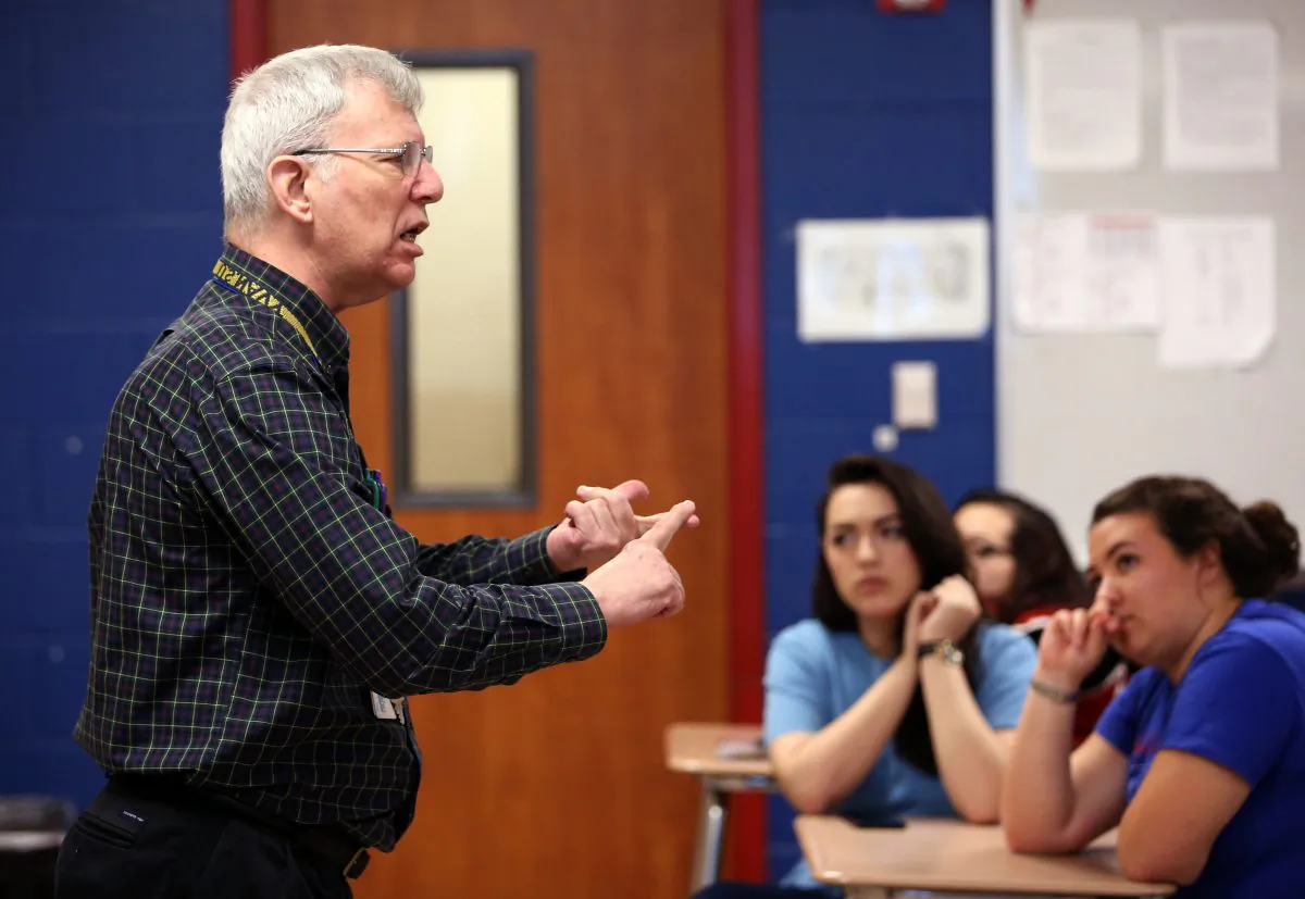 Gregory-Portland High School U.S. history teacher William Schuetz presents his theories during Conspiracy Week in Portland, Texas, on May 10, 2016. (Rachel Denny Clow/Caller-Times via AP)