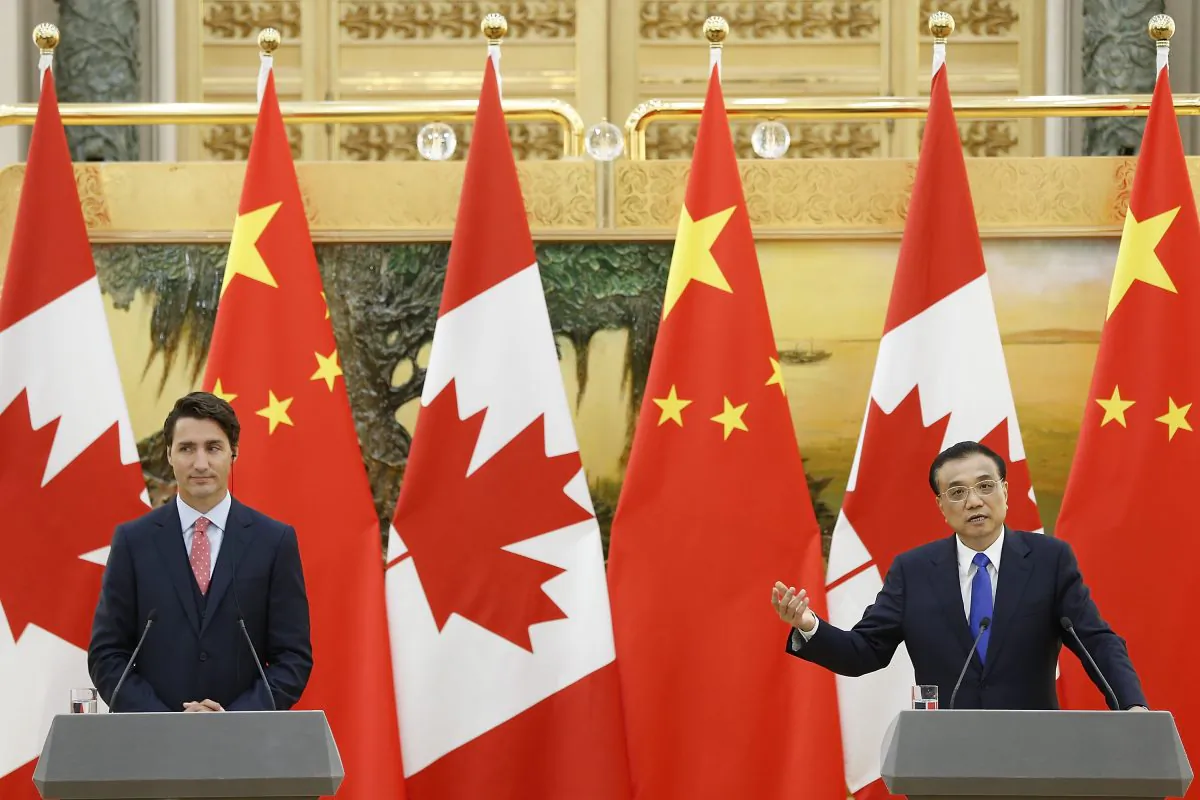 BEIJING, CHINA - AUGUST 31:  Canadian Prime Minister Justin Trudeau (L) with Chinese Premier Li Keqiang addresses a press conference at the Great Hall of the People on August 31, 2016 in Beijing, China. At the invitation of Premier Li Keqiang of the State Council of China, Prime Minister of Canada, Justin Trudeau will pay an official visit to China from Aug 31 to Sep 6.  (Photo by Lintao Zhang/Getty Images)