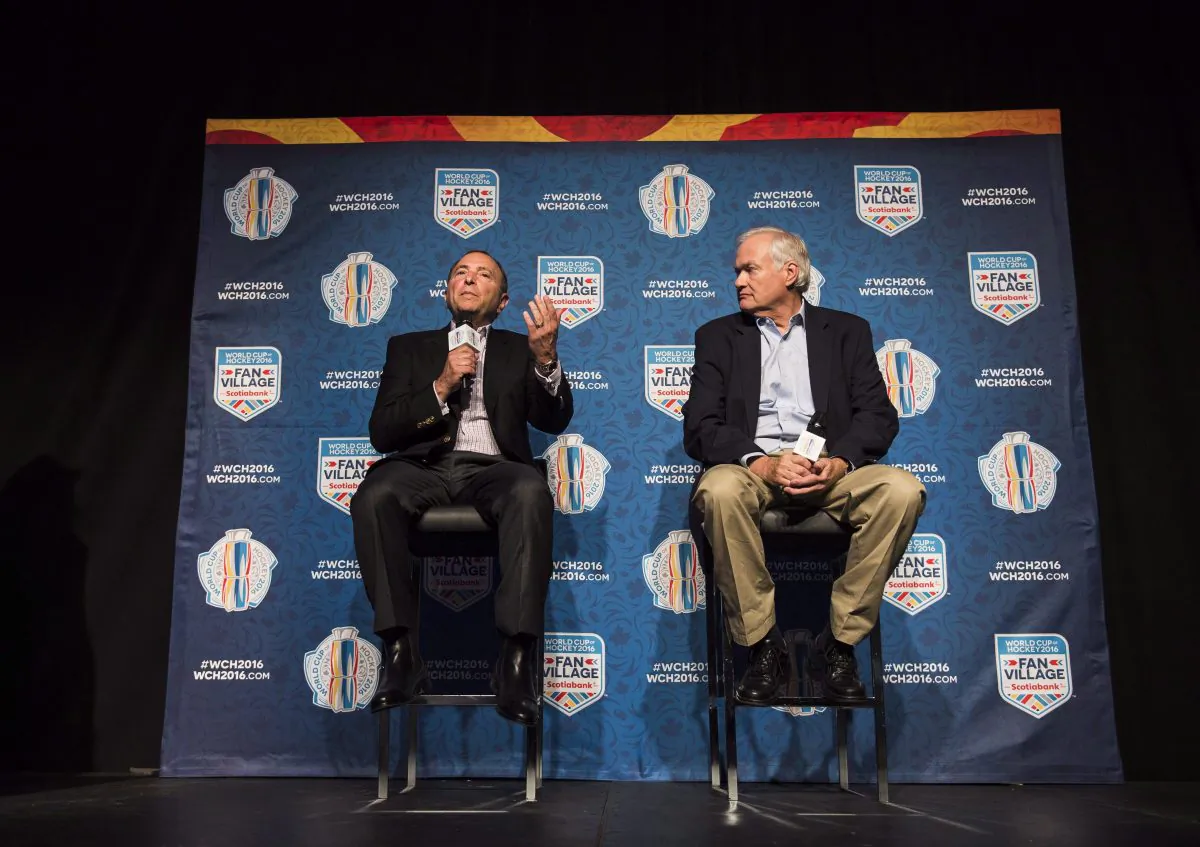 NHL Commissioner Gary Bettman (L) and Executive Director of the NHLPA Don Fehr speak during a press conference about the World Cup of Hockey 2016 in Toronto on Aug. 17, 2016. The two executives kicked off the first Hockey Summit at the Hockey Hall of Fame in Toronto on Sept. 19. (The Canadian Press/Aaron Vincent Elkaim)