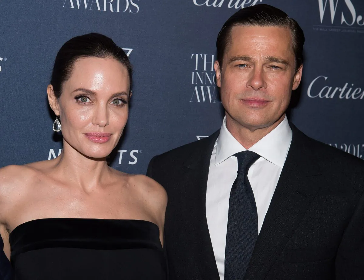 In this Nov. 4, 2015 file photo Angelina Jolie Pitt and Brad Pitt attend the WSJ Magazine Innovator Awards 2015 at The Museum of Modern Art in New York. Jolie and Pitt announced they are divorcing on Sept. 20. Pitt is reportedly under investigation for child abuse. (Photo by Charles Sykes/Invision/AP, File)