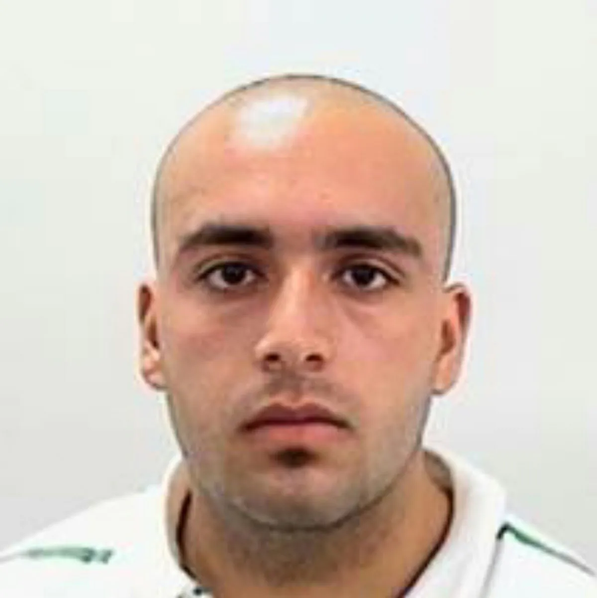 This undated photo provided by the New Jersey State Police shows Ahmad Khan Rahami, wanted for questioning Monday, Sept. 19, 2016, in bombings that rocked the Chelsea neighborhood of New York and the New Jersey shore town Seaside Park. Investigators want to question Rahami's wife, who is currently in Pakistan. (New Jersey State Police