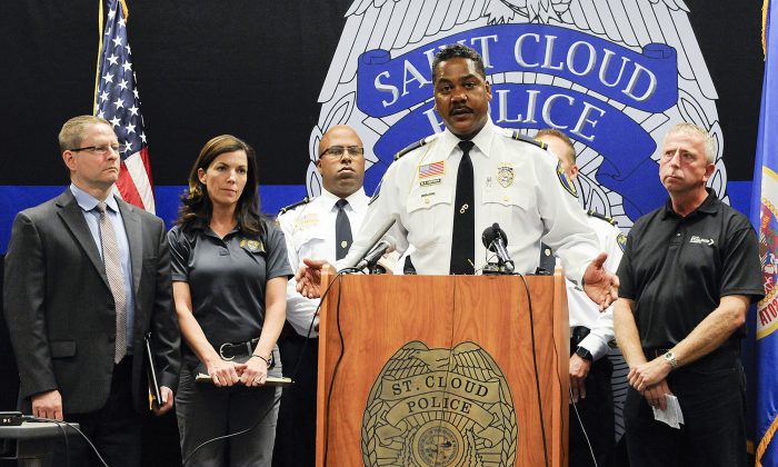 St. Cloud, Minn., Police Chief William Blair Anderson and other officials hold a press conference Sunday, Sept. 18, 2016, giving updated information on the Crossroads Center incident at the St. Cloud Police Department. A man in a private security uniform stabbed nine people at a Minnesota shopping mall Saturday, reportedly asking one victim if they were Muslim before an off-duty police officer shot and killed him in an attack the Islamic State group claimed as its own.  (Jason Wachter/St. Cloud Times via AP)