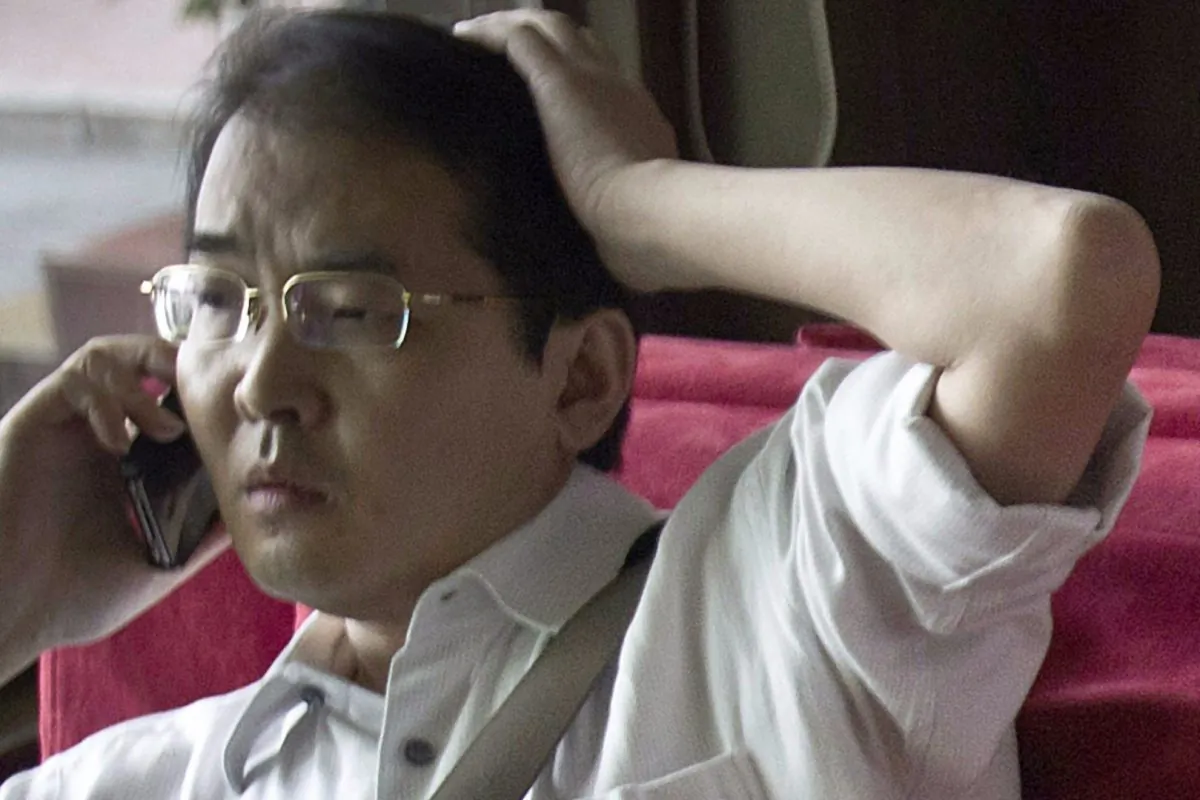 Chinese activist lawyer Xia Ling in a July 14, 2011 file photo. Xia was sentenced to 12 year in prison on fraud charges on Sept. 22, 2016. (AP Photo/Andy Wong)
