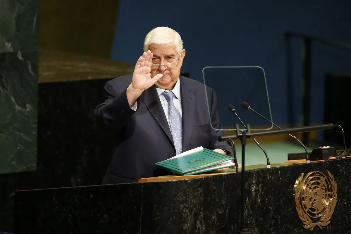 Syria's Foreign Minister Walid al-Moallem waves after addressing the 71st session of the United Nations General Assembly at U.N. headquarters on Sept. 24, 2016. (AP Photo/Jason DeCrow)