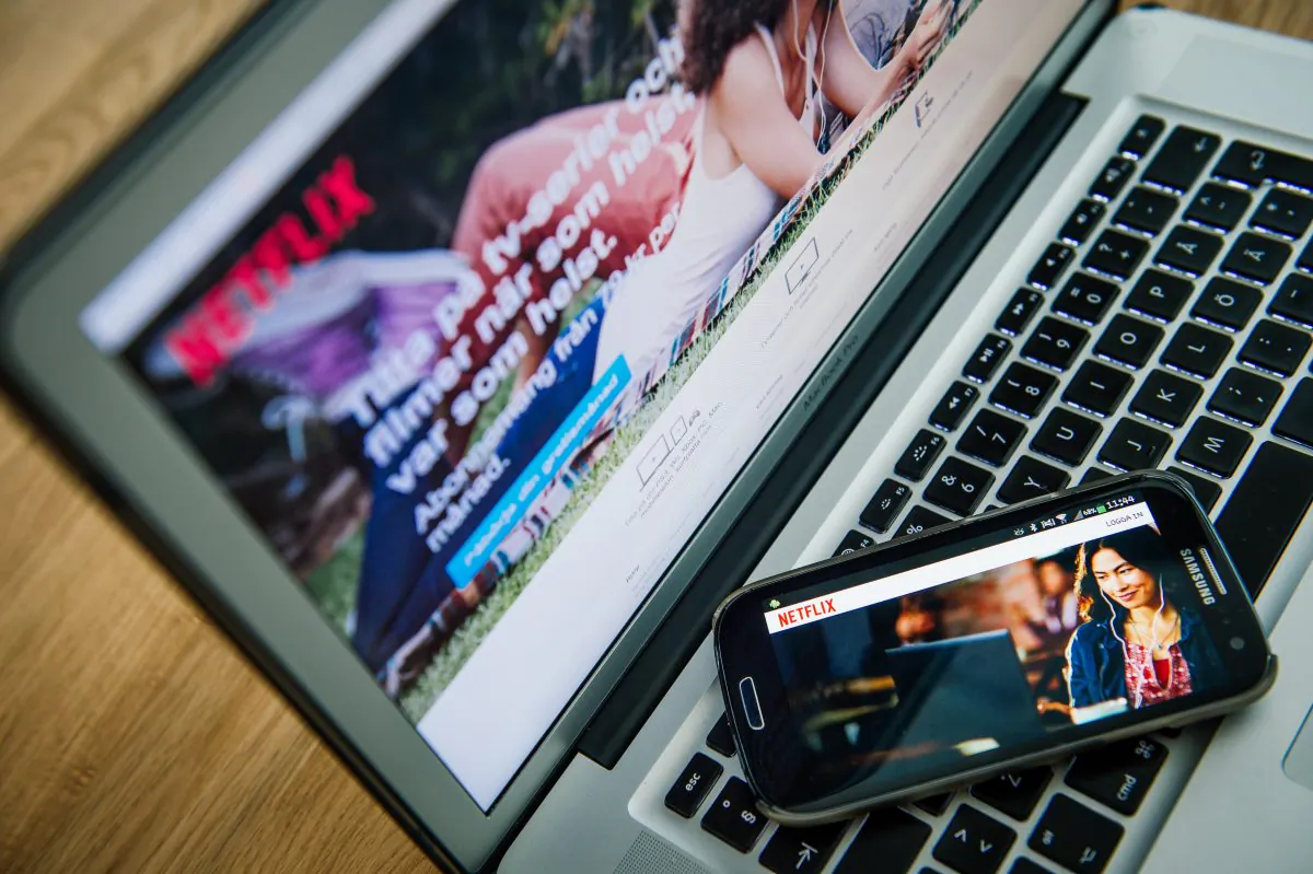 Netflix streaming video is shown on a laptop and smartphone in a file photo. (Jonathan Nackstrand/AFP/Getty Images)