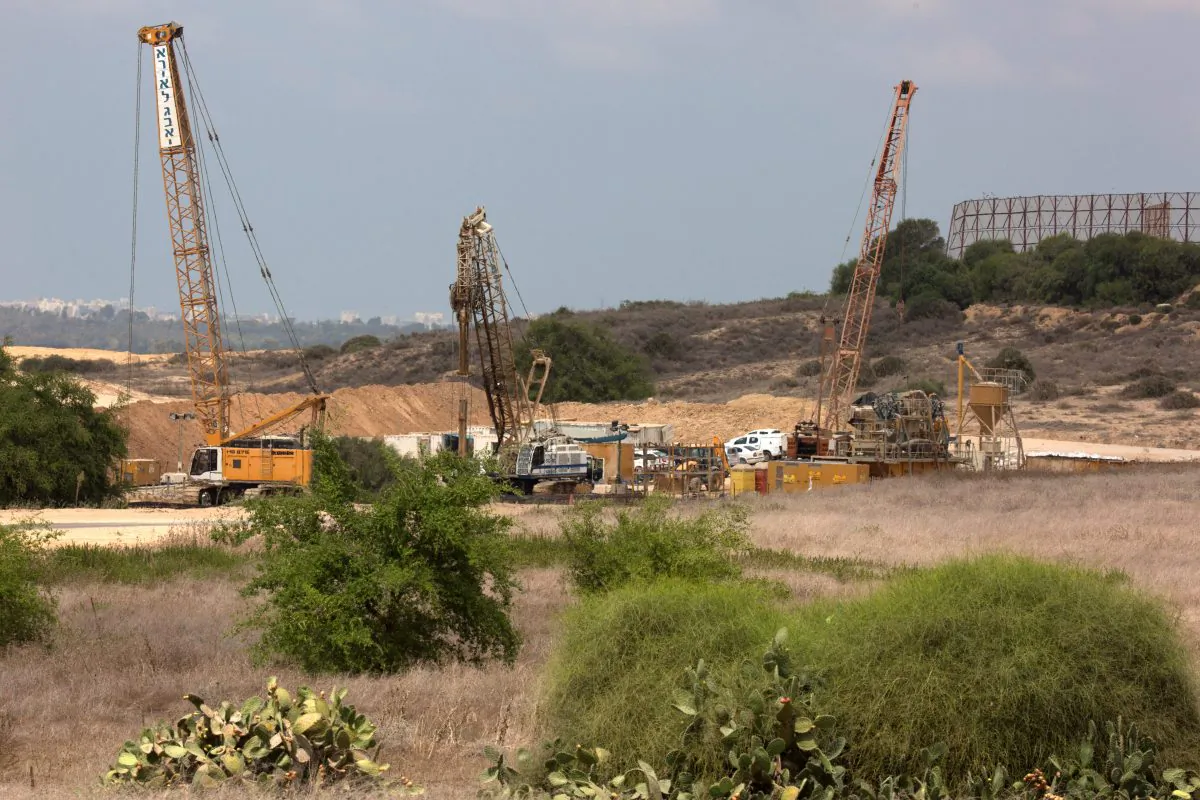 Cranes and other machineries are seen at the Israeli side of the border with Gaza Strip, on Sept. 8, 2016. Israel is building an underground wall around Gaza to stop Hamas attack tunnels, Israeli media and a local council official said. (Menahem Kahana/AFP/Getty Images)