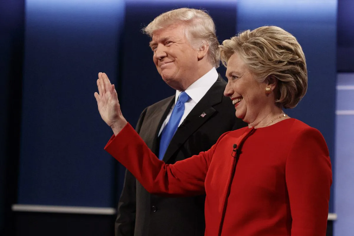 Republican presidential candidate Donald Trump (L) and Democratic presidential candidate Hillary Clinton before the first presidential debate at Hofstra University in Hempstead, New York, on Sept. 26, 2016. (AP Photo/ Evan Vucci)