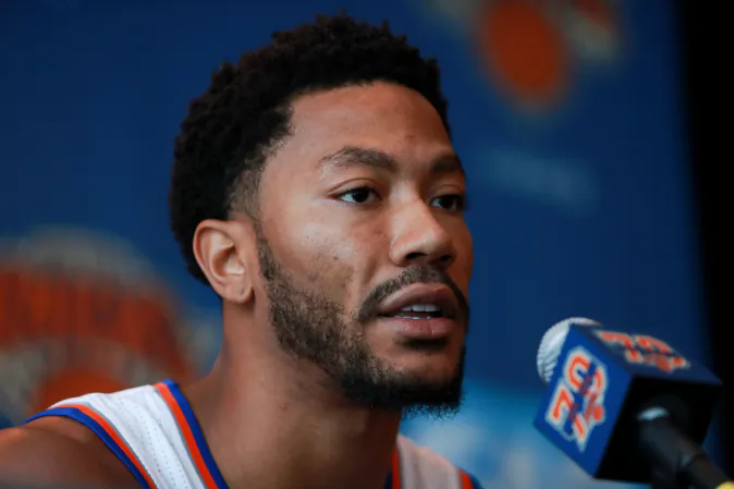  Derrick Rose #25 of the New York Knicks addresses the media during the New York Knicks Media Day at the Ritz Carlton on September 26, 2016 in White Plains, New York. Rose is a subject of a criminal investigation by LAPD into rape allegations. (Michael Reaves/Getty Images 