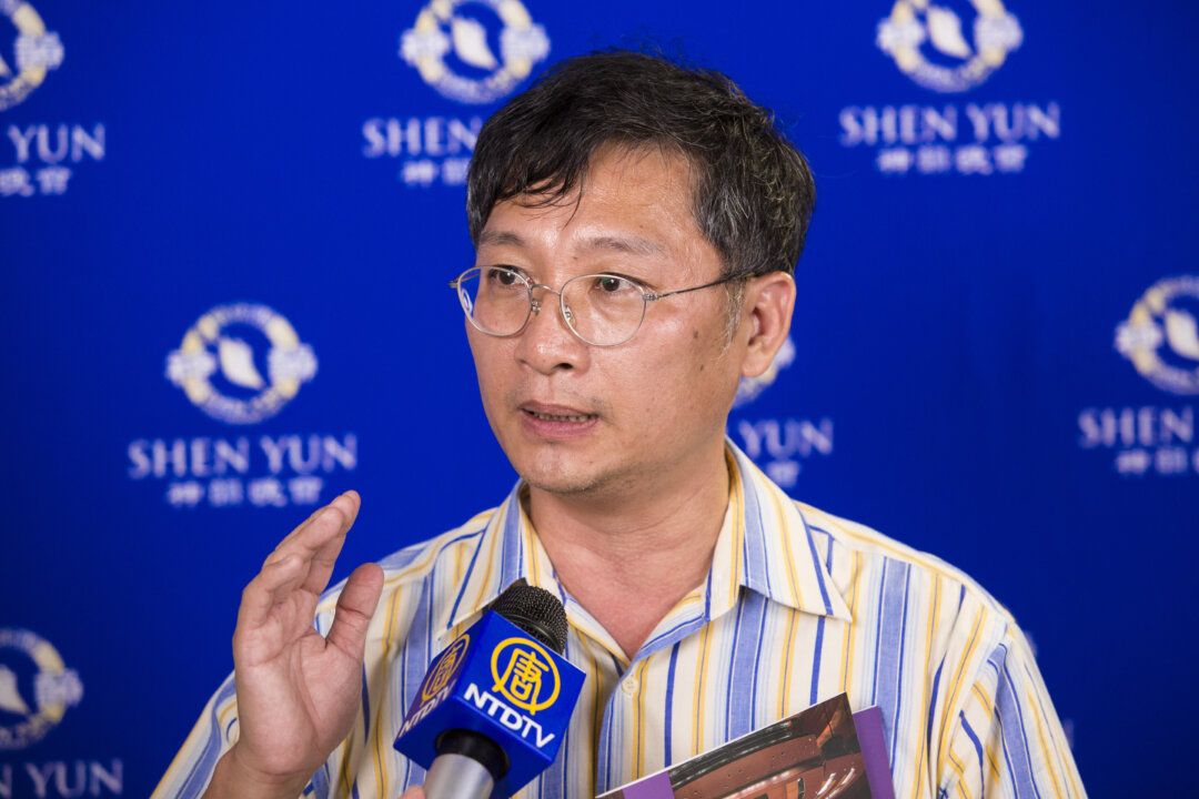 Tang Cheng-chia, a college lecturer at a local university, attends the evening performance of Shen Yun Symphony Orchestra in Tainan, Taiwan on Sept. 24, 2016. (Chen Ting/Epoch Times)