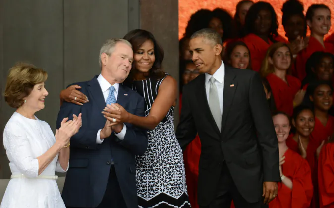 Michelle Obama and George Bush Hug Goes Viral