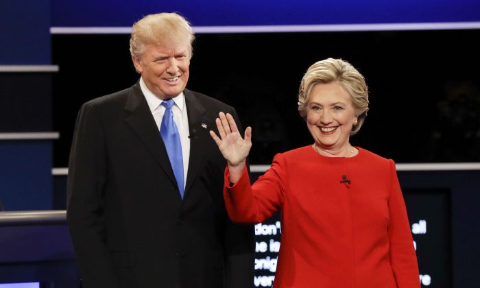 Republican presidential candidate Donald Trump and Democratic presidential nominee Hillary Clinton are introduced during the presidential debate at Hofstra University in Hempstead, N.Y., on Sept. 26, 2016. (AP Photo/David Goldman)
