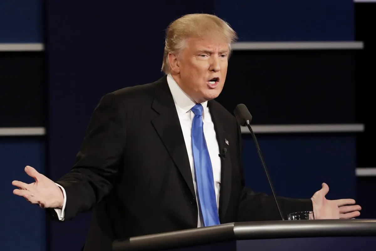Republican presidential nominee Donald Trump during the presidential debate with Democratic presidential nominee Hillary Clinton at Hofstra University in Hempstead, N.Y., on Sept. 26, 2016. Trump said he was given a defective microphone. (AP Photo/David Goldman)