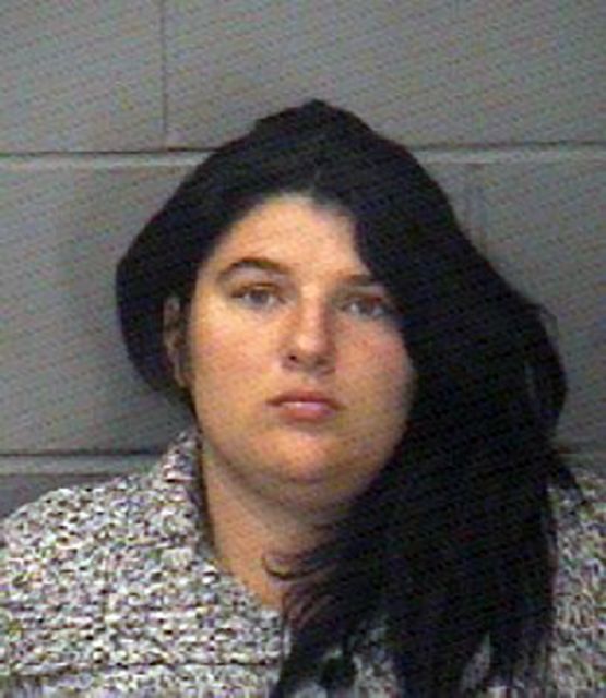 This photo released by the Elkhart, Ind., Police Department shows Amber Pasztor. Pasztor, was arrested on two counts of murder Monday, Sept. 26, 2016, in the deaths of seven-year-old Liliana Hernandez and six-year-old Rene Pasztor, who were the subject of an Amber Alert. (Elkhart Police Department via AP)