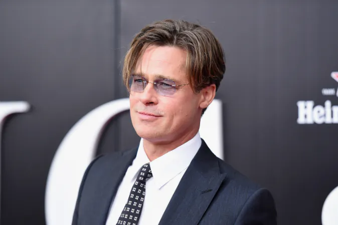 Actor Brad Pitt attends the premiere of 'The Big Short' at Ziegfeld Theatre on November 23, 2015 in New York City. Pitt will not attend "Voyage of Time" premiere on Sept. 28. (Jamie McCarthy/Getty Images)