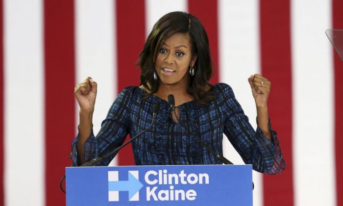 First lady Michelle Obama speaks at LaSalle University in Philadelphia, Wednesday, Sept. 28, 2016, as she campaigns for presidential candidate Hillary Clinton. (AP Photo/Mel Evans)