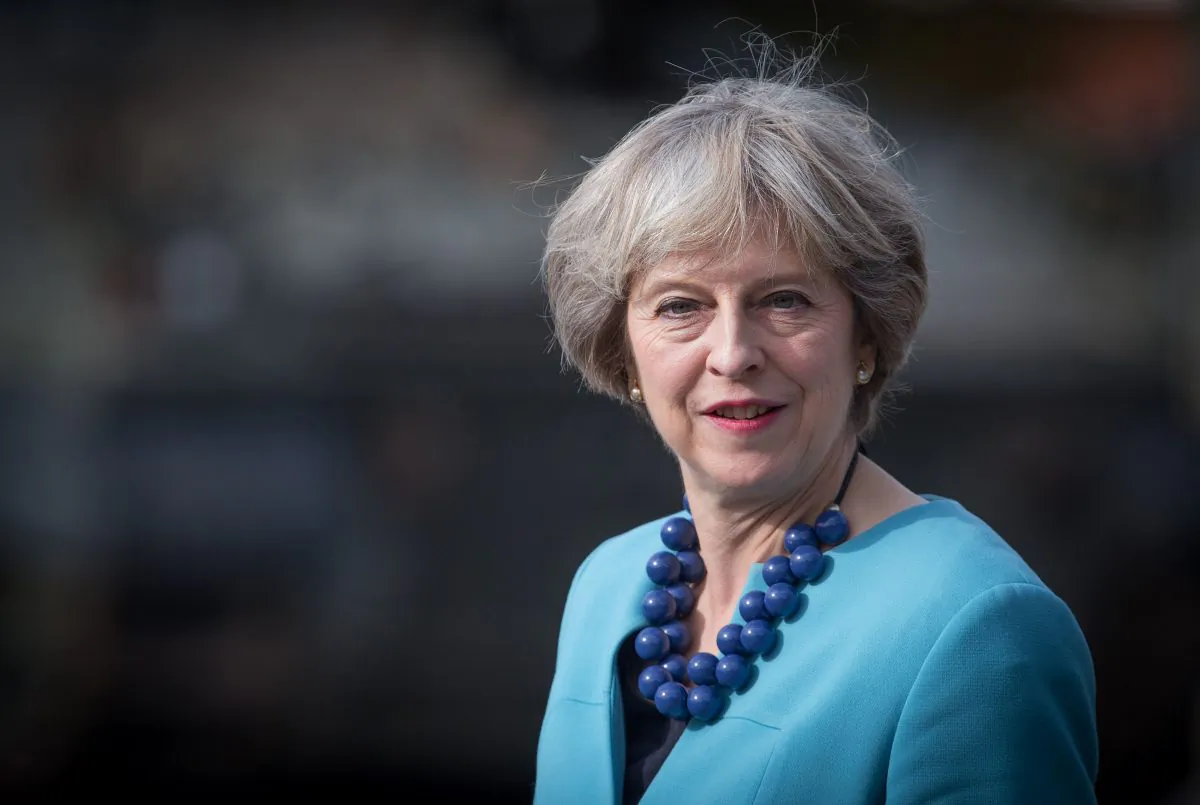 Britain's Prime Minister Theresa May reacts visits the 1st Battalion The Mercian Regiment at their barracks at Bulford Camp near Salisbury, southwest England, on Sept. 29, 2016. (Matt Cardy/AFP/Getty Images)
