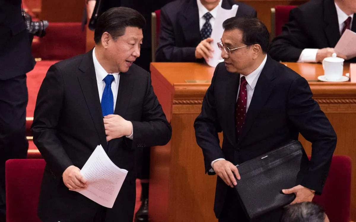 Chinese leader Xi Jinping and Chinese premier Li Keqiang at the Great Hall of the People in Beijing on March 3, 2016. (Johannes Eisele/AFP/Getty Images)