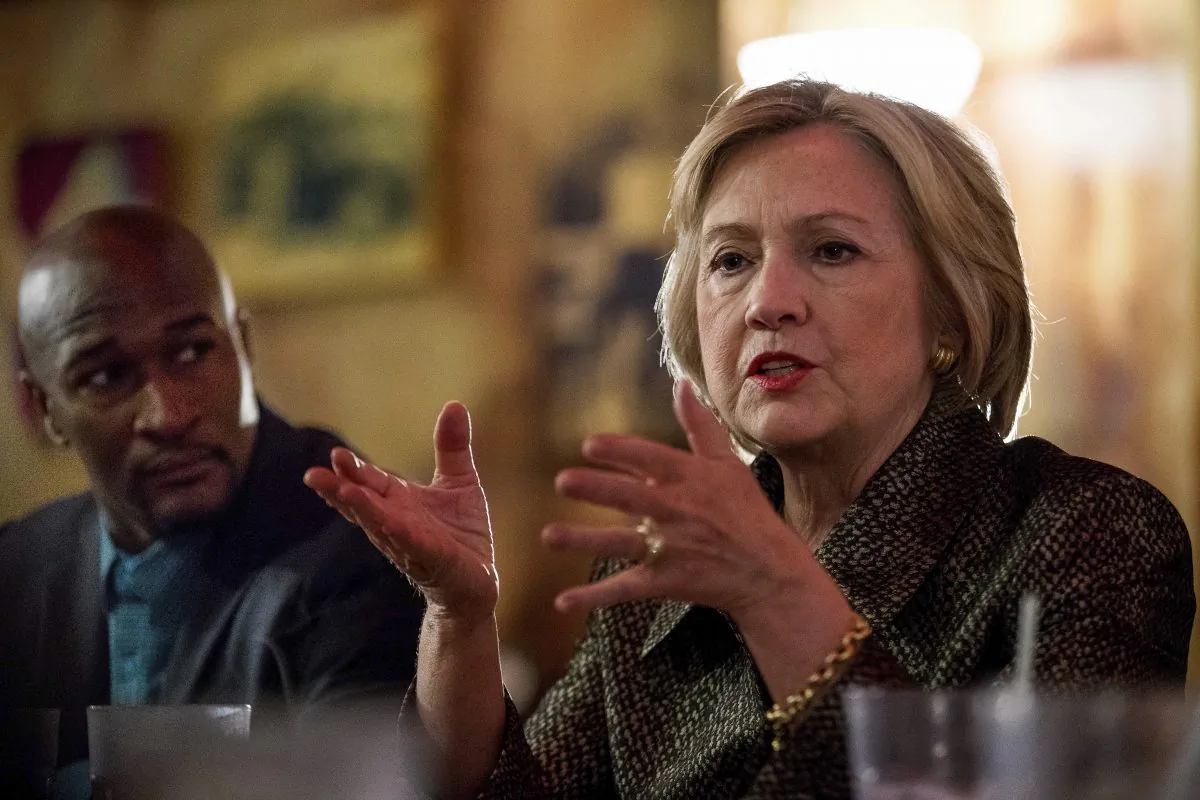 Democratic presidential candidate Hillary Clinton meets with African American community leaders at Mert's Heart & Soul in Charlotte, N.C., Sunday, Oct. 2, 2016, to discuss the urgency of addressing racial, economic and social justice issues. (AP Photo/Andrew Harnik)