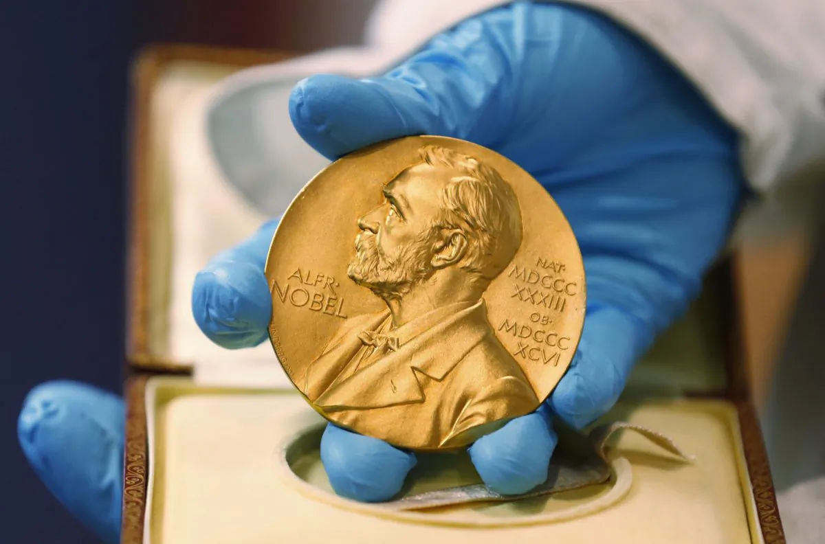 A gold Nobel Prize medal. Zhang Shoucheng, a Stanford physicist, who was being touted for a Nobel Prize in Physics killed himself. (AP Photo/Fernando Vergara, FILE)