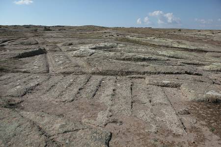 Petrified impressions in stone, Dr. Alexander Koltypin said were likely left by cargo placed there by the same civilization that drove over the area in vehicles that left ruts still visible today. (Courtesy of Dr. Alexander Koltypin)