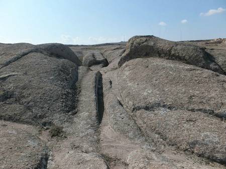 Wheel ruts in stone, in the Phrygian Valley, Turkey. (Courtesy of Dr. Alexander Koltypin)