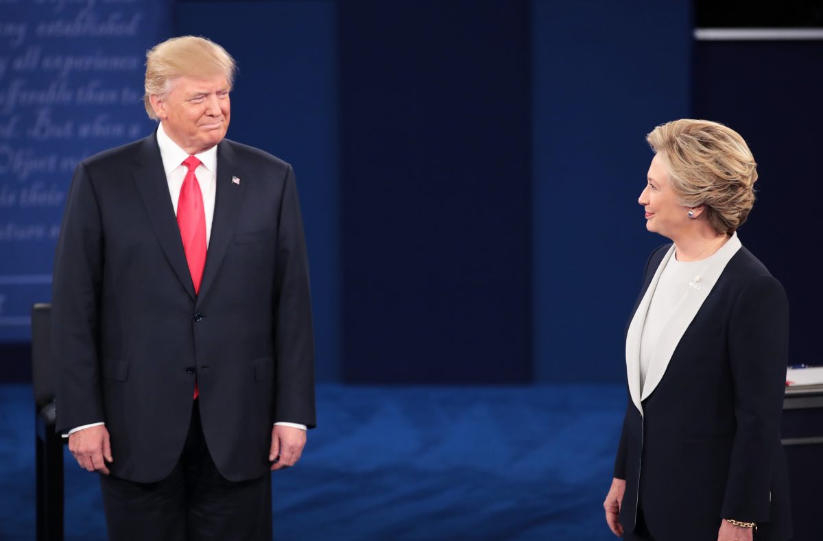 Republican presidential nominee Donald Trump (L) and Democratic presidential nominee Hillary Clinton during the town hall debate at Washington University in St. Louis, Missouri, on Oct. 9, 2016. (Scott Olson/Getty Images)