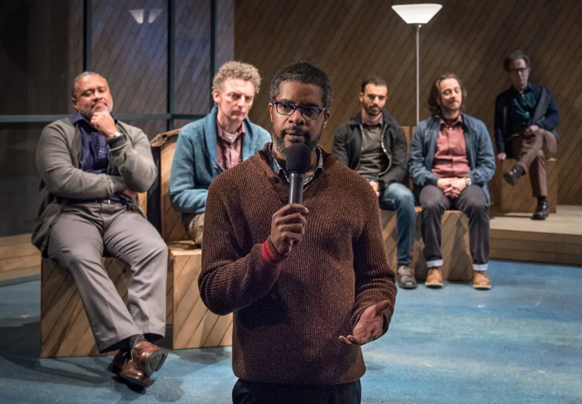 (L–R) Dr. Thomas Stockmann (Jimonn Cole) will tell the truth at any cost, at a town meeting, in “Public Enemy.” Behind him, the cast (L–R) Guisseppe Jones, John Keating, Alex Purcell, Robbie Tann, and 
Dominic Cuskern. (Russ Rowland)