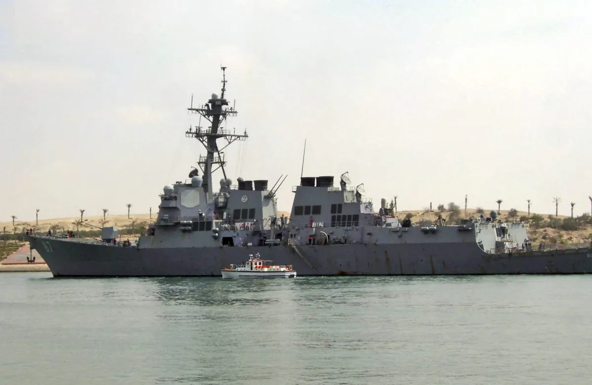 In this Saturday, March 12, 2011 file photo, U.S. destroyer USS Mason sails in the Suez canal in Ismailia, Egypt. Two missiles fired from rebel-held territory in Yemen landed near an American destroyer passing by in the Red Sea, the U.S. Navy said on Monday, Oct. 10, 2016. (AP Photo/File)