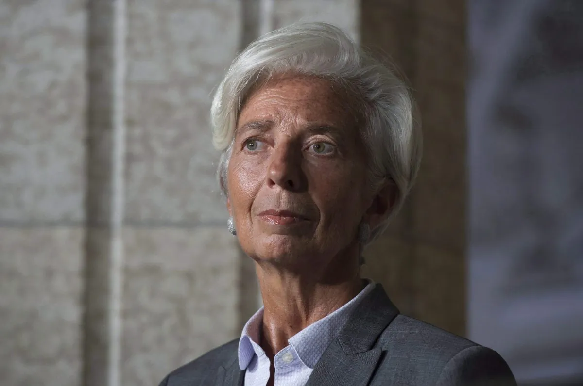Christine Lagarde, managing director of the International Monetary Fund, listens to a question during a news conference with Prime Minister Justin Trudeau in Ottawa on Sept. 13, 2016. Lagarde strongly advocates a greater role for women in business to improve economic growth. (The Canadian Press/Adrian Wyld)