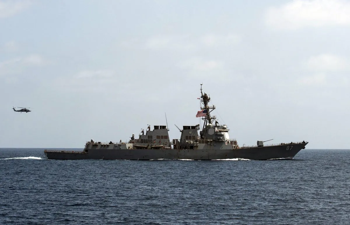 In this image released by the U.S. Navy, the USS Mason (DDG 87) conducts maneuvers as part of a exercise in the Gulf of Oman on Sept. 10, 2016. (Mass Communication Specialist 1st Class Blake Midnight/U.S. Navy via AP)