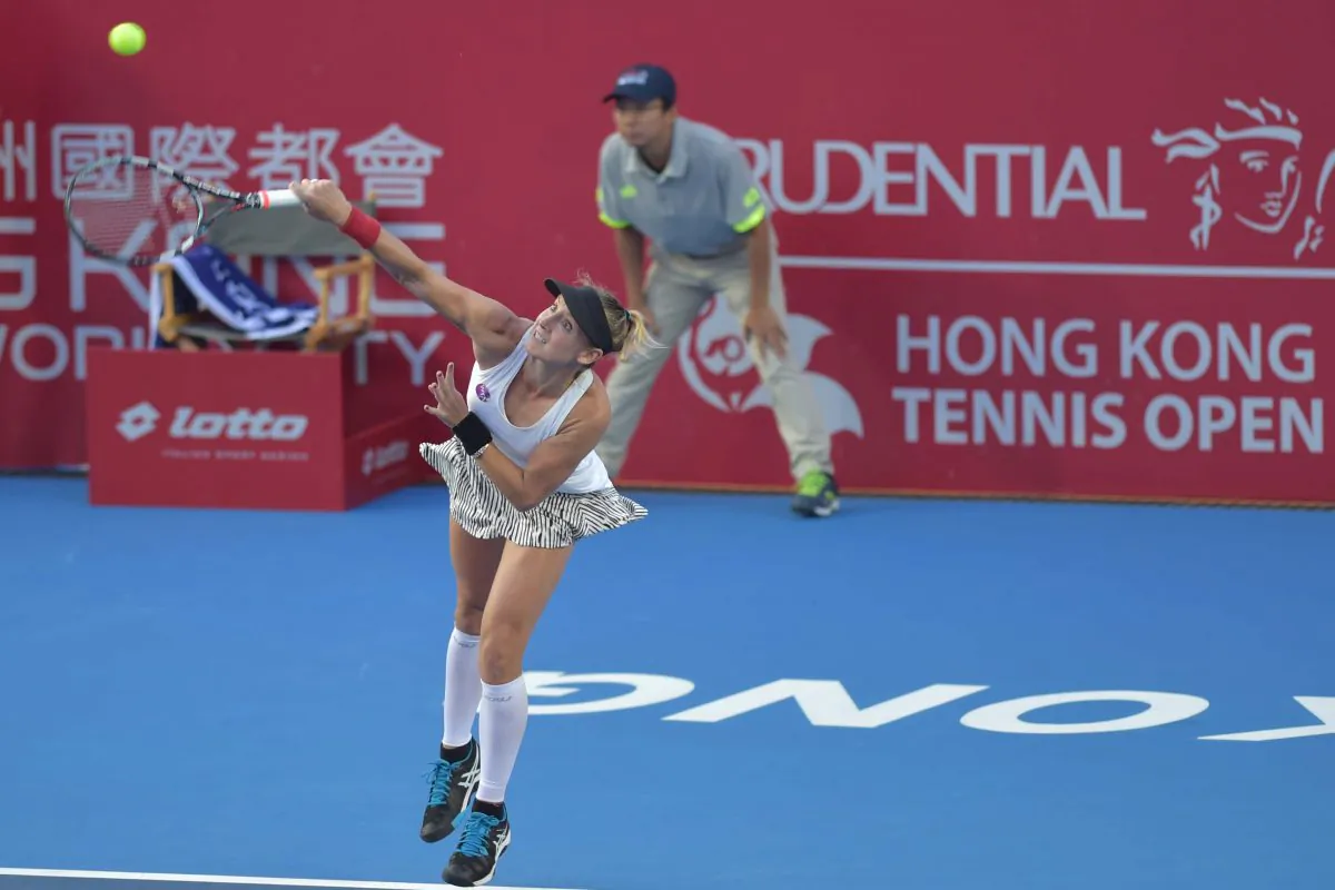 Bethanie Mattek-Sands, of the USA serves to Caroline Garcia of France during their 2nd round match at the Hong Kong Open, at Victoria Park Stadium on Thursday Oct 13. Mattek-Sands won the match in 3 sets to move into the quarter finals where she will play Kristina Mladenovic also of France. (Bill Cox/Epoch Times)