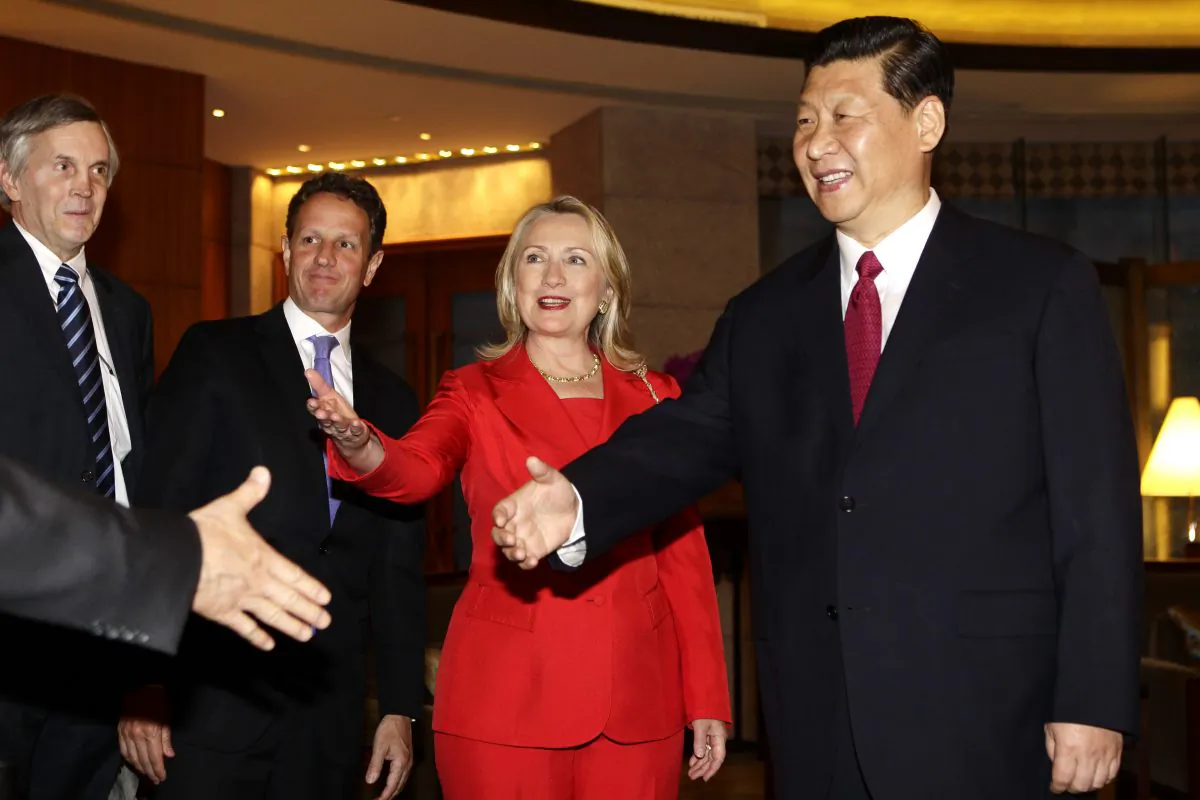 Chinese leader Xi Jinping meets U.S. Secretary of State Hillary Clinton, U.S. Treasury Secretary Timothy Geithner (2nd R) and other delegates during a meeting at Diaoyutai State Guesthouse in Beijing, on May 3, 2012. (Jason Lee/AFP/GettyImages)