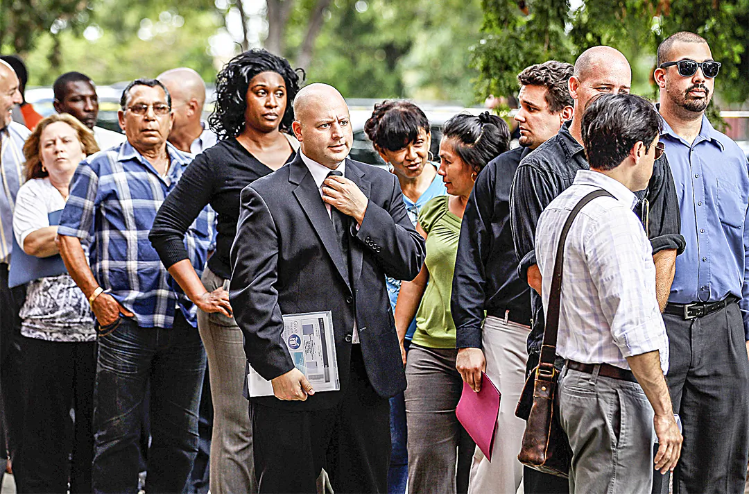 Job seekers line up to apply for one of 2,000 openings with Major League Baseball's Miami Marlins in this file photo. (Joe Readle/Getty Images)