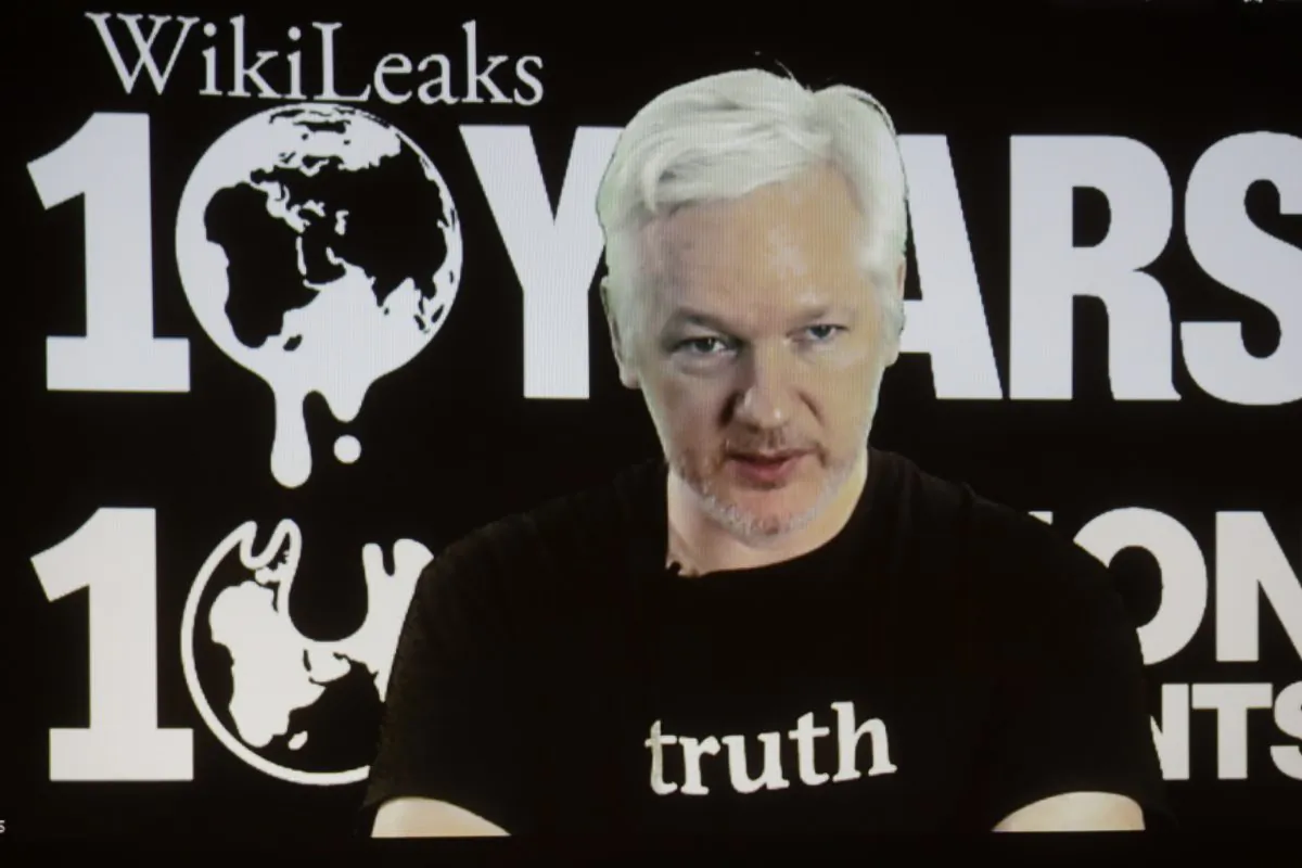 WikiLeaks founder Julian Assange participates via video link at a news conference marking the 10th anniversary of the secrecy-spilling group in Berlin, on Oct. 4, 2016. (AP Photo/Markus Schreiber, File)