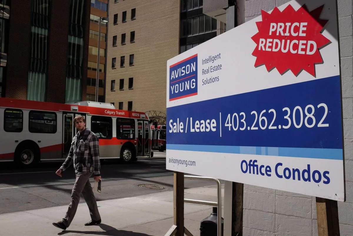 A sign advertising office space for lease in downtown Calgary on April 13, 2016. Once the thriving financial pulse of the energy industry, Calgery is struggling to adjust to the new economic reality due to tanking oil prices. (THE CANADIAN PRESS/Jeff McIntosh)