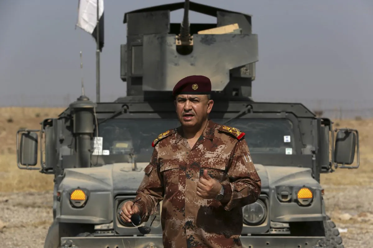 The Commander of the Joint Military Operation Commander, Army Lt. Gen. Talib Shaghati, speaks during an interview with The Associated Press in in the town of Khazer, Iraq, Oct. 17, 2016. (AP Photo/Khalid Mohammed)
