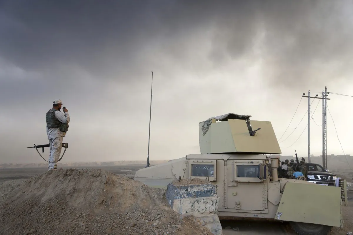 Smoke rises from Islamic state positions after an airstrike by coalition forces in Mosul, Iraq, Tuesday, Oct. 18, 2016. The pace of operations slowed on Tuesday as Iraqi forces began pushing toward larger villages and encountering civilian populations on the second day of a massive operation to retake the northern Iraqi city of Mosul from the Islamic State group. (AP Photo)